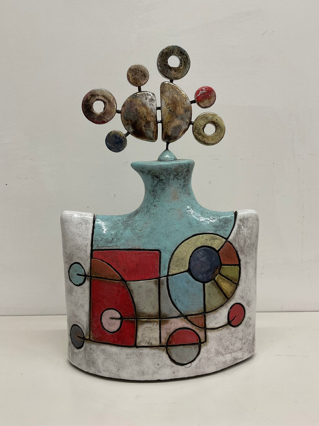 Scatola in ceramica con due volti per custodire i ricordi