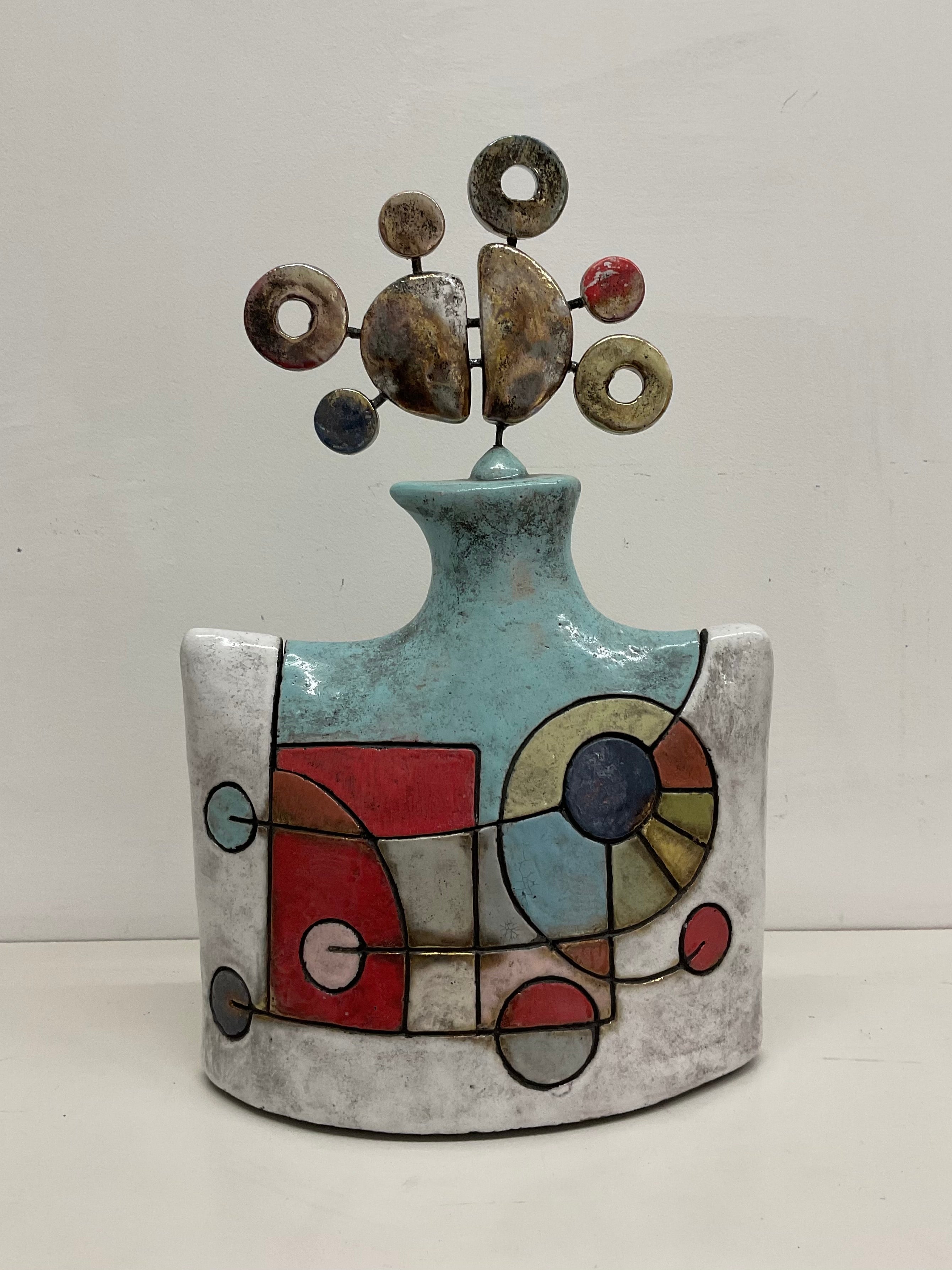 Scatola in ceramica con due volti per custodire i ricordi